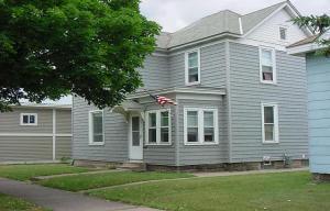 1646 Kane St, La Crosse, WI 54603 - rear view of house with a lawn