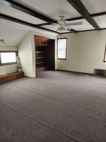 1646 Kane St, La Crosse, WI 54603 - bonus room with beam ceiling, carpet flooring, baseboards, and a ceiling fan