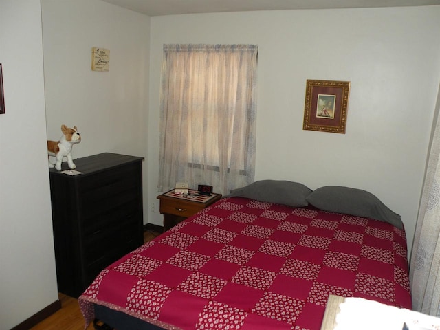 bedroom featuring hardwood / wood-style flooring