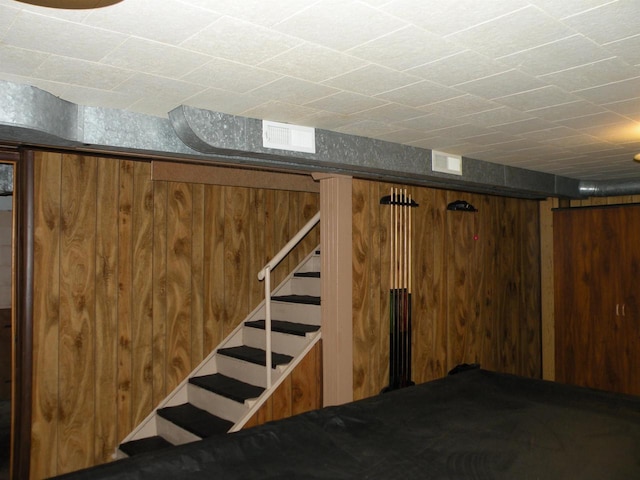 basement with wood walls