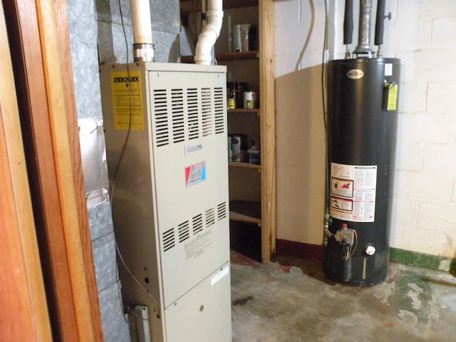 utility room featuring water heater and heating unit