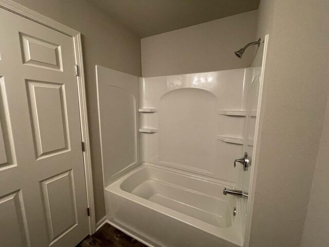 corridor with dark hardwood / wood-style floors