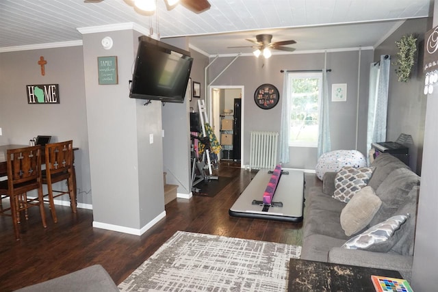 living room featuring wooden ceiling, dark hardwood / wood-style floors, ceiling fan, and ornamental molding