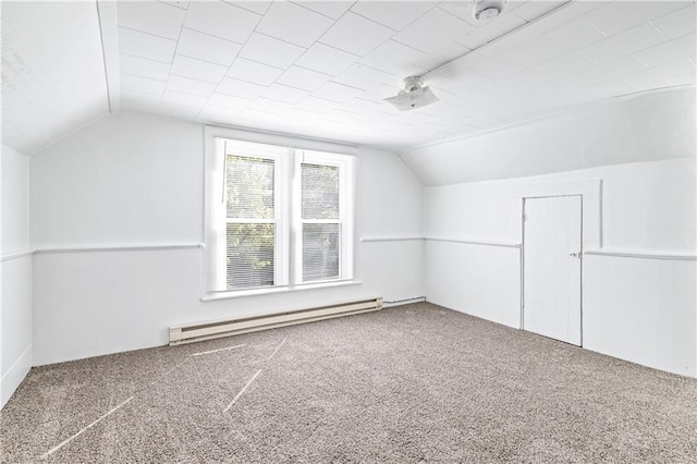 bonus room featuring vaulted ceiling, baseboard heating, and carpet floors