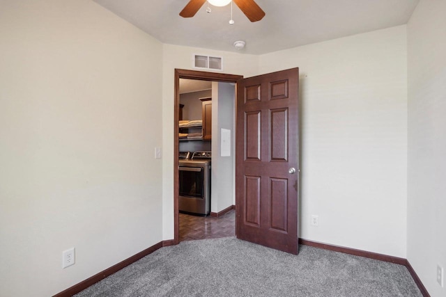 carpeted empty room with ceiling fan