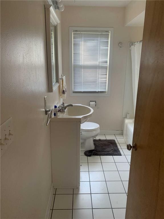 full bathroom with shower / bathtub combination with curtain, vanity, toilet, and tile patterned flooring