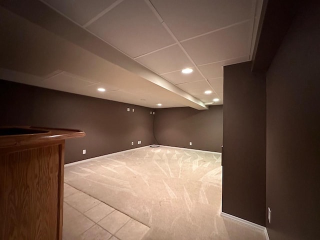 basement featuring carpet flooring