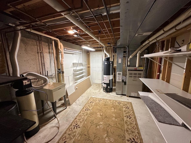 basement featuring gas water heater