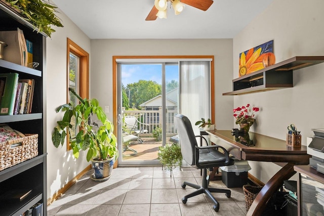 home office featuring ceiling fan and light tile patterned floors