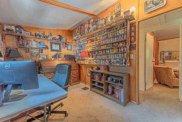 home office featuring light carpet and wooden walls