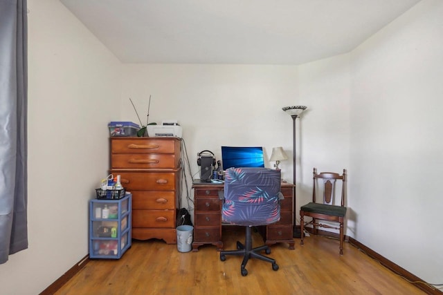 home office featuring hardwood / wood-style floors