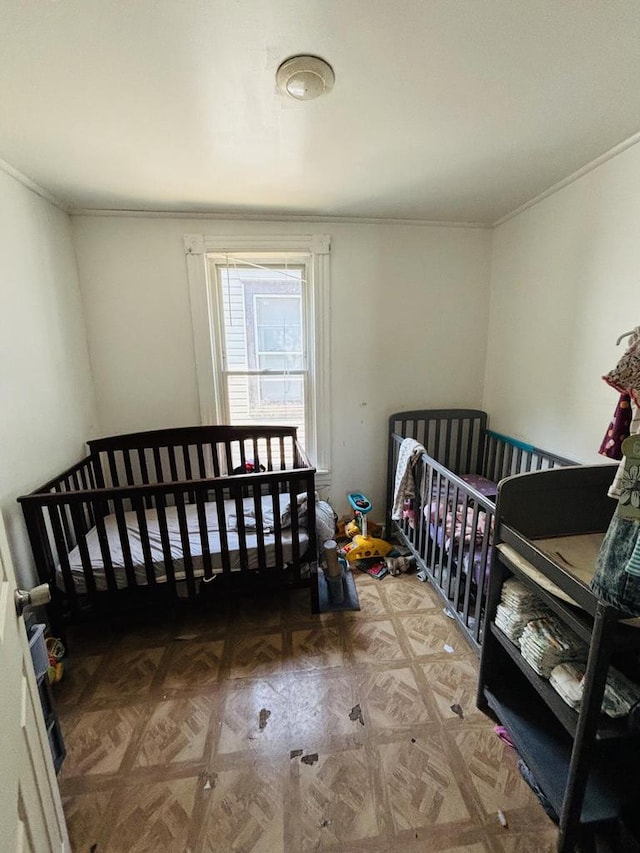 bedroom with parquet flooring