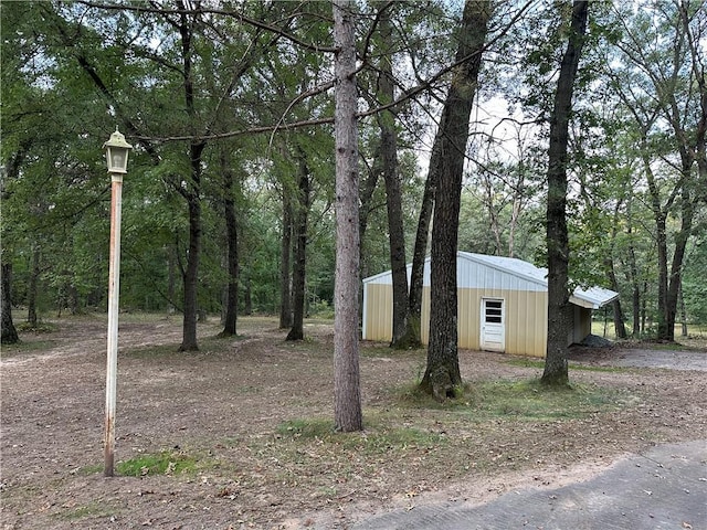 view of side of home with an outbuilding