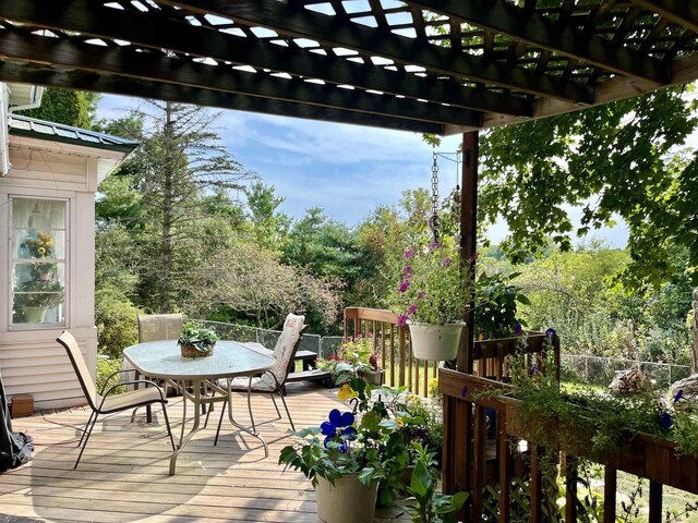 deck featuring a pergola