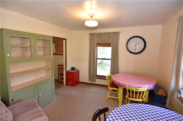 bedroom featuring light colored carpet