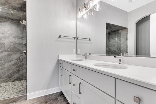 bathroom with vanity and an enclosed shower