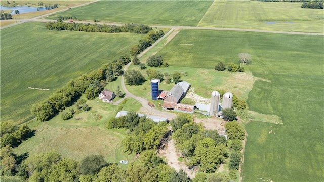 bird's eye view with a water view and a rural view