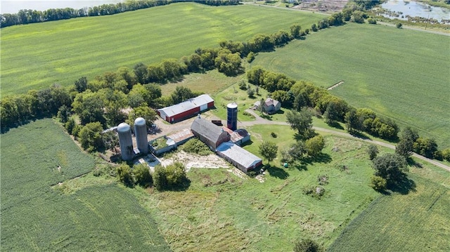 birds eye view of property with a rural view