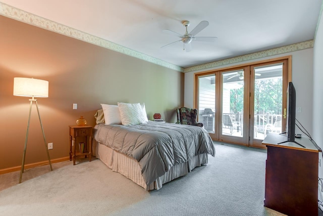 carpeted bedroom with ceiling fan and access to exterior