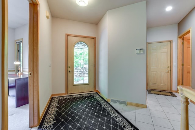 view of tiled foyer entrance