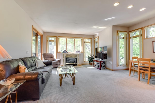 carpeted living room featuring a wealth of natural light