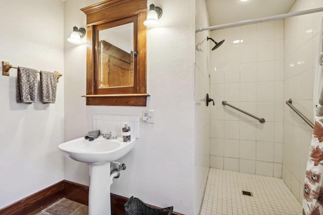 bathroom featuring a shower with shower curtain and tile patterned floors