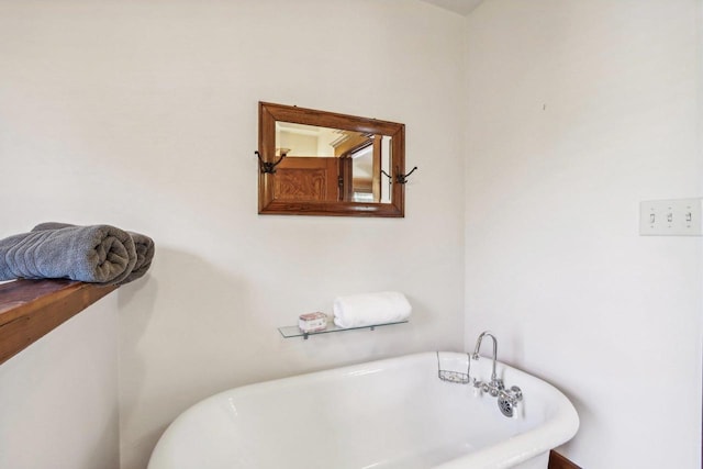 bathroom featuring a tub