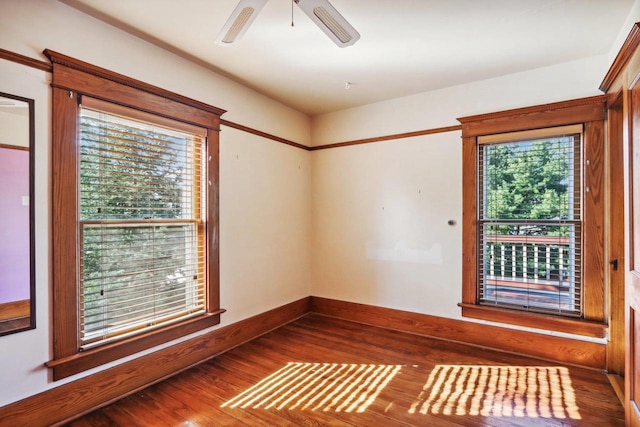 spare room with ceiling fan and hardwood / wood-style floors