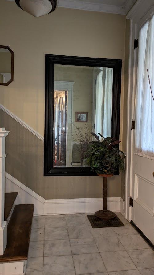 interior space featuring a wainscoted wall and stairway