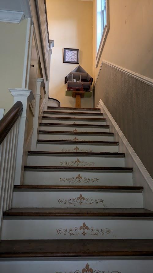 staircase with wainscoting