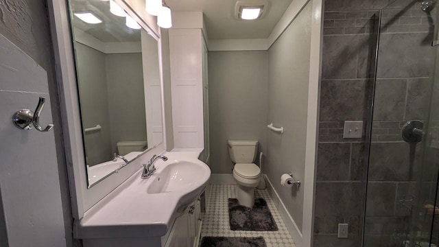 full bath featuring tile patterned flooring, a shower stall, and toilet