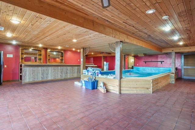 interior space featuring wood ceiling and tile patterned floors