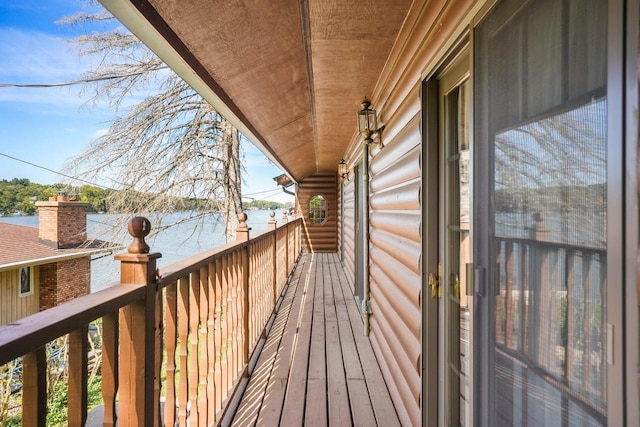 balcony featuring a water view