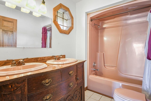 full bathroom with vanity, tile patterned flooring, shower / tub combo, and toilet