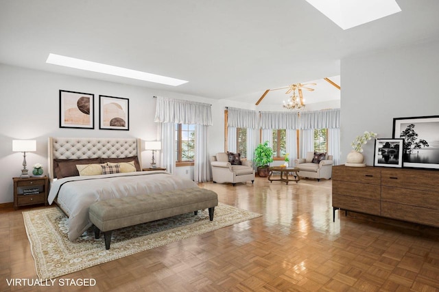 bedroom with a notable chandelier and light parquet flooring