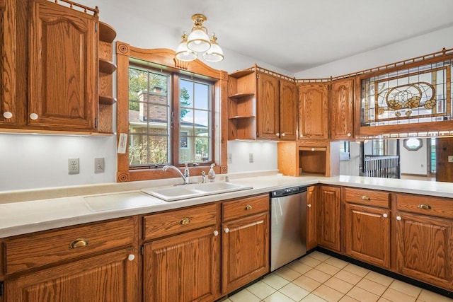 kitchen with dishwasher, light tile patterned flooring, and sink