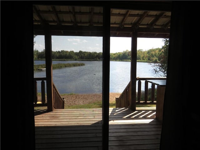 dock area with a deck with water view