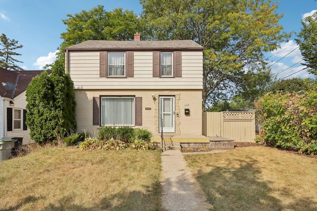 view of front of home featuring a front yard