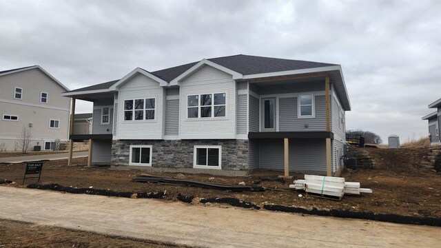2876 Wild Goose Way, Stoughton, WI 53589 - view of front of home featuring stone siding and a shingled roof