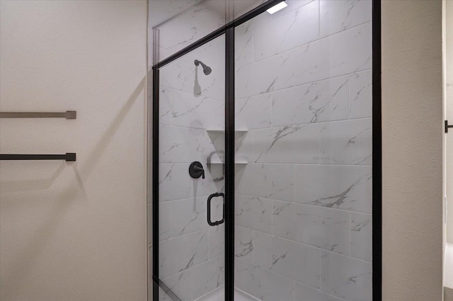 bathroom featuring walk in shower