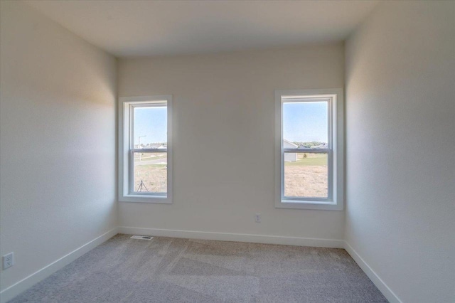 view of carpeted spare room