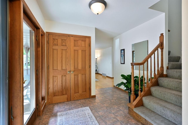 entrance foyer featuring a healthy amount of sunlight