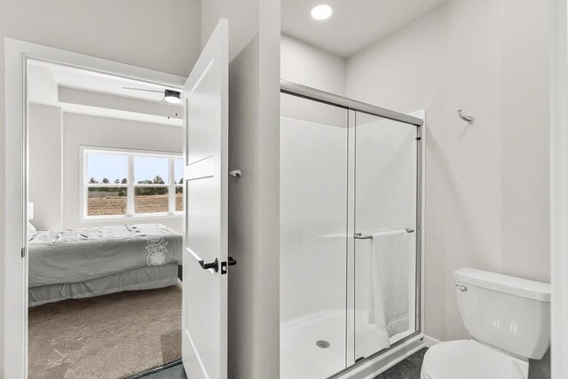 ensuite bathroom with toilet, a stall shower, and ensuite bath