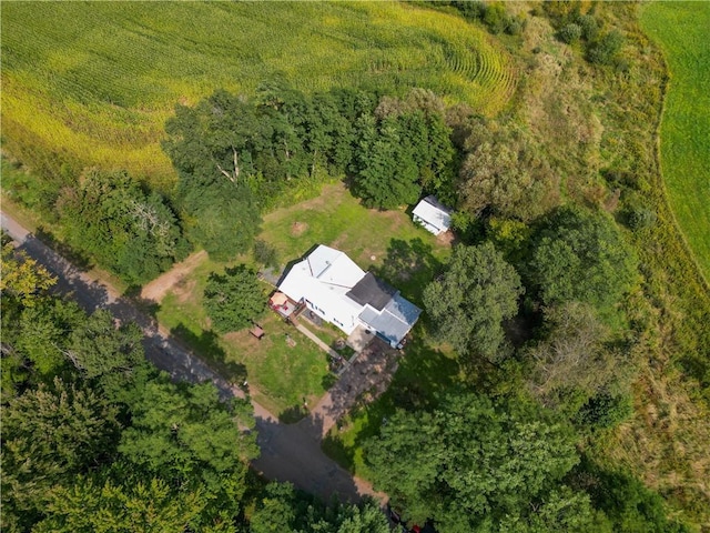 birds eye view of property with a rural view