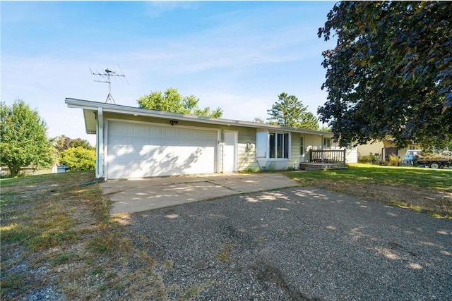 single story home featuring a garage