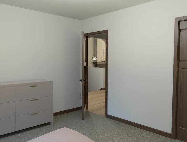 unfurnished bedroom with light carpet