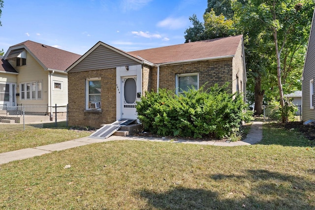 view of front of house with cooling unit and a front yard