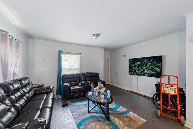 living room with hardwood / wood-style flooring and ornamental molding