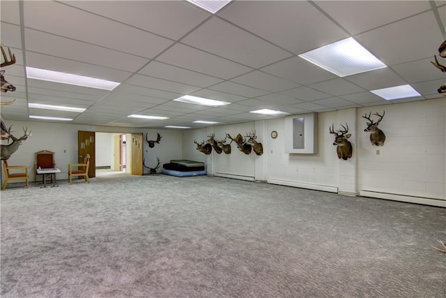 interior space with carpet, baseboard heating, electric panel, and a paneled ceiling