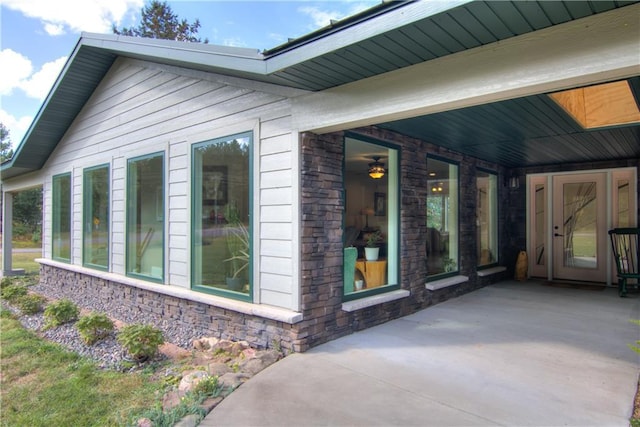 view of home's exterior with a patio area